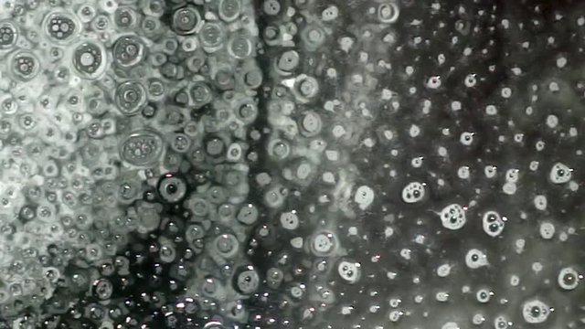 Spraying water drops on surface