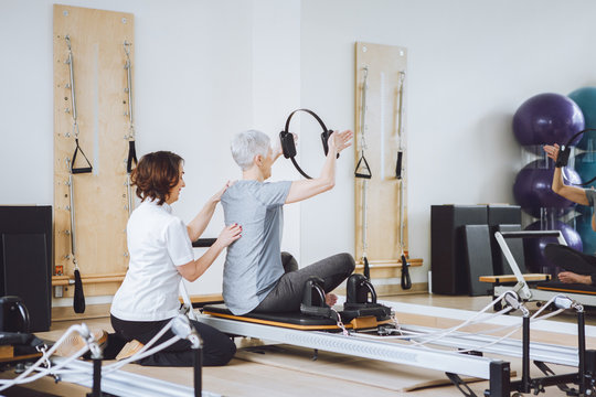 Senior Woman Doing Spine Exercise
