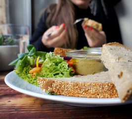 Beautiful portion of hummus and salad