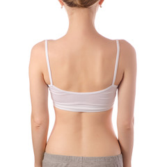 Fototapeta na wymiar Young beautiful woman in white t-shirt top bra female back health beauty
