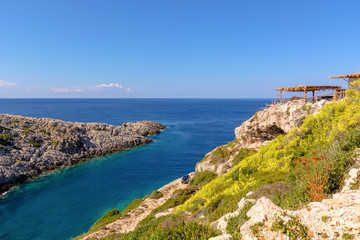 Fototapeta na wymiar View of bay with crystal sea water next to Korakonisi Island on western side of Zakynthos. Zante, Greece