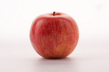 Red apple isolated on white background.