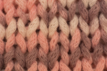 Knitted background. Knitted texture. Knitting pattern of wool. Knitting. Background.