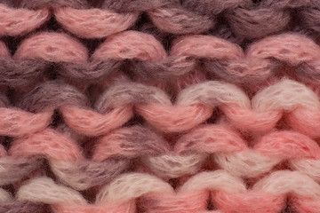 Knitted background. Knitted texture. Knitting pattern of wool. Knitting. Background.