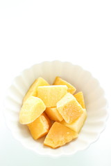 Frozen mango on white background for dessert image