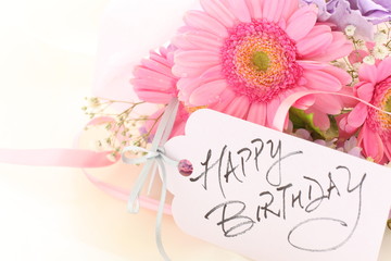hand wriiten birthday card and Gerbera pastel color bouqet