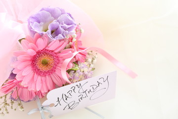 hand wriiten birthday card and Gerbera pastel color bouqet