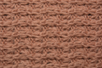 Knitted background. Knitted texture. Knitting pattern of wool. Knitting. Background.