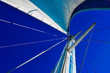 Sailing yacht against the blue sky.