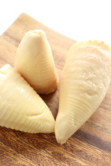 Boiled Bamboo shoot on wooden plate for spring food ingredient