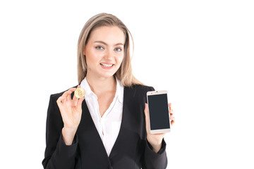 Businesswoman holding bitcoin and smartphone with smile isolated on white background.