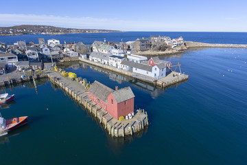 Fototapeta premium Rockport Harbor and Motif Number 1 aerial view in Rockport, Massachusetts, USA. This building is a fishing shack built in 1840, and now is the the most famous symbol of New England maritime life.