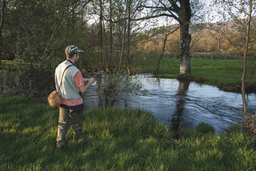 Fototapeta na wymiar sport fisherman in river, Galicia, Spain.