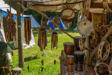 Medieval musical instruments hanged on a open market display