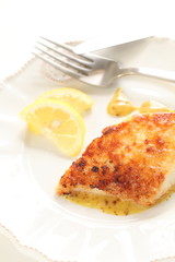 Homemade french style White fish sauteed with mustard sauce