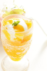 Homemade mango and vanilla ice cream in glass for gourmet dessert image