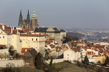 Fototapeta na wymiar Sunny freezy winter Prague City with gothic Castle, Czech Republic