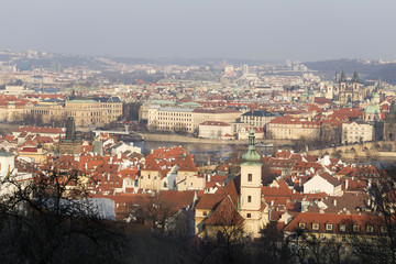 Fototapeta na wymiar Sunny freezy winter Prague City with its Cathedrals, historical Buildings and Towers, Czech Republic