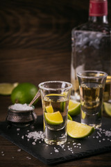 Tequila shot with lime and sea salt