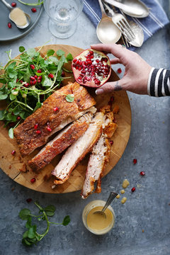 14 hours slow roasted pork belly with watercress and pomegranate salad.