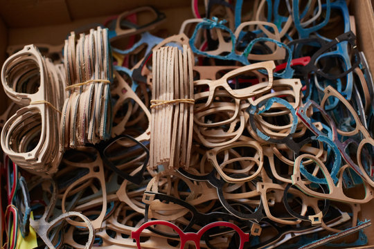 Unfinished eyeglasses frames in a box of an artisan atelier