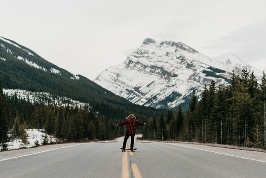 Skateboarder in the wild