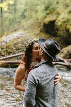Couple Kissing in Oregon Landscape