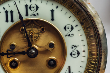Close-up of a vintage clock dial