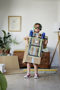 Happy Boy In Robot Costume At Home