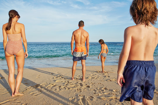 Family on the beach on vacation in Mexico