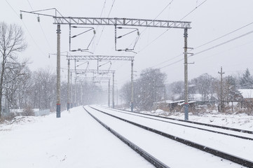 Blizzard on the railway tracks in winter