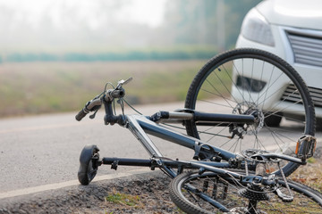 Accident car crash with bicycle on road
