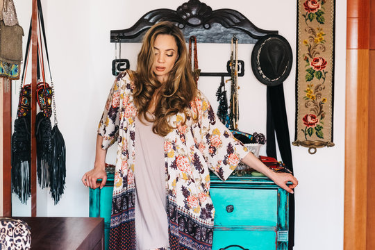 Portrait of a beautiful female model at home