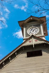 Sapporo Clock Tower in day time clear sky. The Clock tower is the oldest building standing in Sapporo