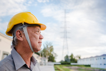 Engineer inspecting the high voltage power grid