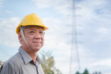 Engineer inspecting the high voltage power grid