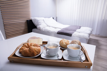 Croissants And Cup Of Tea In Tray