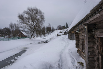 Baths on black, standing on the river bank in the village of Vyatskoe Russia.