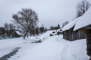 Baths on black, standing on the river bank in the village of Vyatskoe Russia.