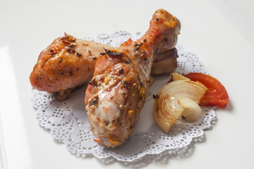 two appetizing baked chicken legs