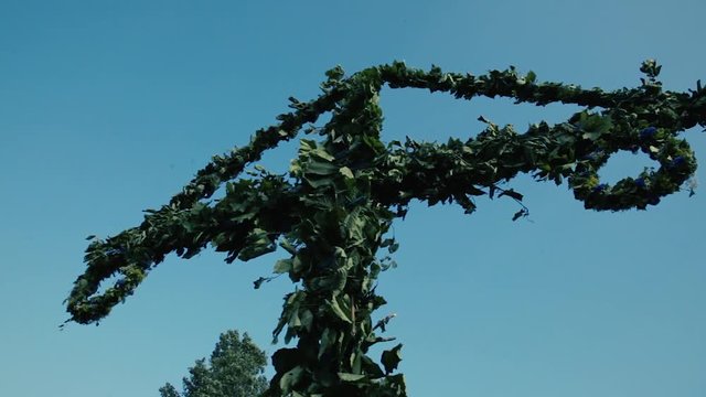 Swedish maypole midsummer celebration