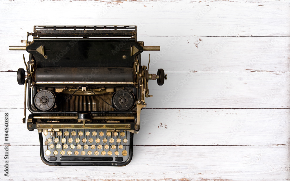 Fototapete vintage typewriter header. retro machine technology - top view and creative flat lay design.