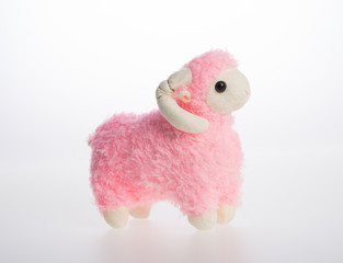 toy or goat or sheep on a background.
