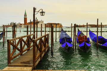 Views of canals and ancient architecture of Venice.