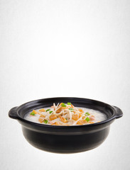 Porridge or Scallop Porridge (congee) served in claypot.