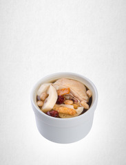 herb soup or chinese herb soup on a background.