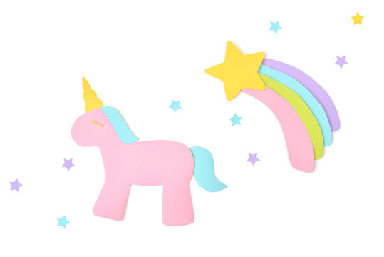 Unicorn and rainbow paper cut on white background - isolated