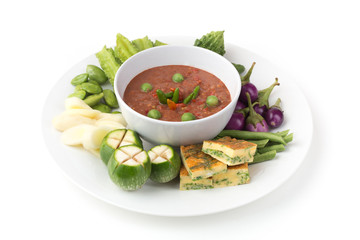Shrimp Paste Chilli Sauce (Nam Prik Ka Pi) with omelet and vegetable set, Thai Food, on white background.