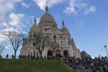 Fototapeta premium PARIS, FRANCE - MARCH 24, 2016: Crowd of tourists walking near S