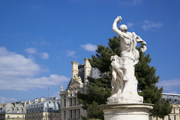 Fototapeta na wymiar PARIS, FRANCE - MARCH 22, 2016: famous Tuileries garden. Tuileries Garden (Jardin des Tuileries) is a public garden located between the Louvre Museum and the Place de la Concorde